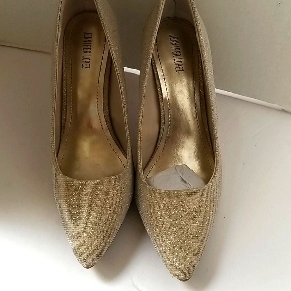 Jennifer Lopez gold sparkle brown stilettos
